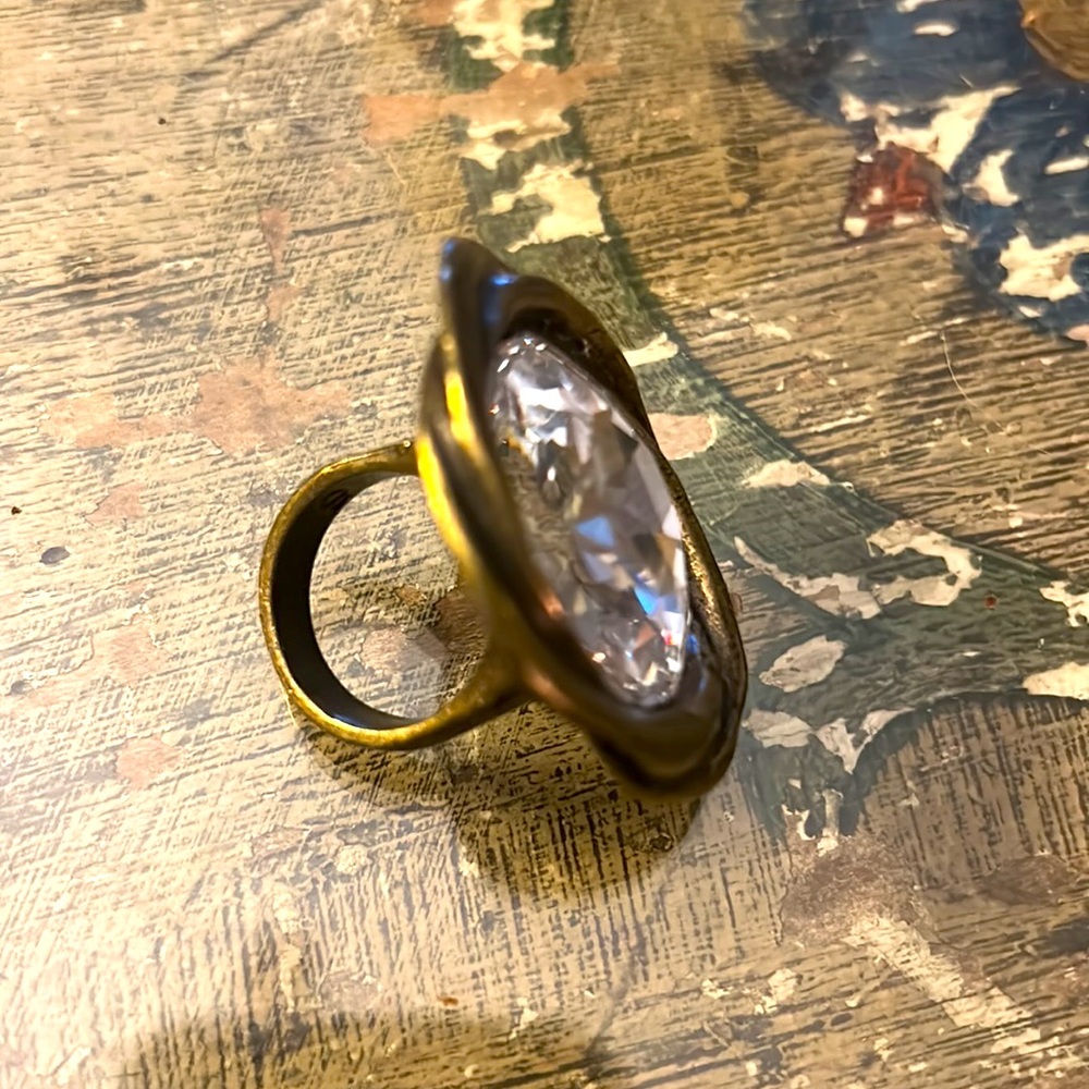 Avant Garde large bold faceted center rhinestone statement ring brass color